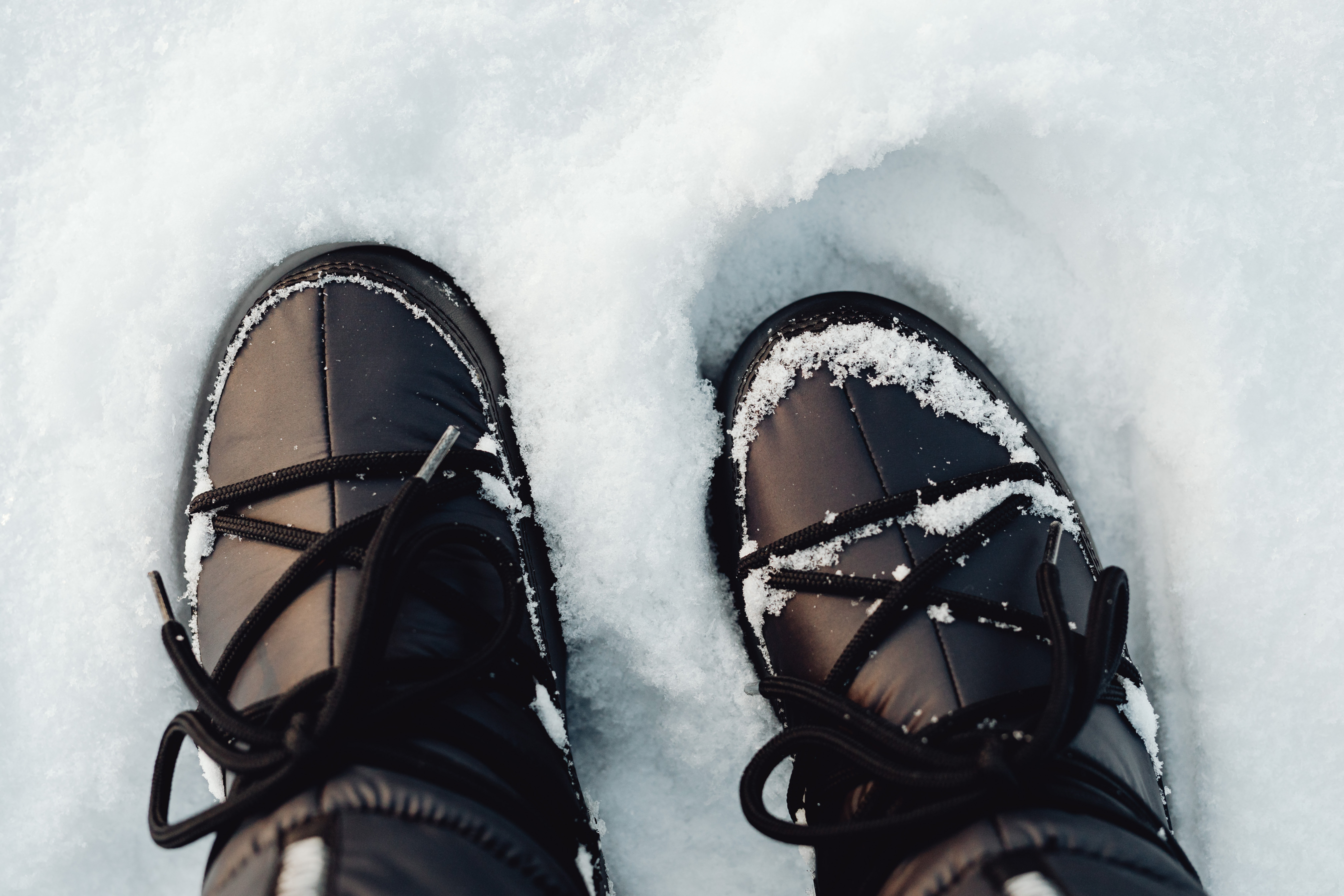 Winter boots walking in snow